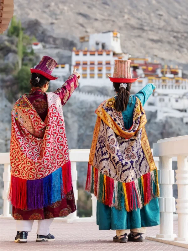 two-women-in-vibrant-traditional-leh-attire-point-2026-03-25-09-40-36-utc